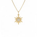 14k Twisted Gold Diamond Starburst Charm by Orlina Fine