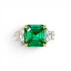 6.00 CTW Lab Grown Colombian Emerald and Trapezoid Diamond Three Stone Engagement Ring by Orlina Fine