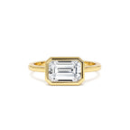 1.50 CTW East West Emerald Cut Lab Grown Bezel Setting Modern Engagement Ring by Orlina Fine