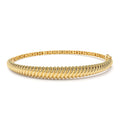 14K Gold Twist Bangle Bracelet by Orlina Fine