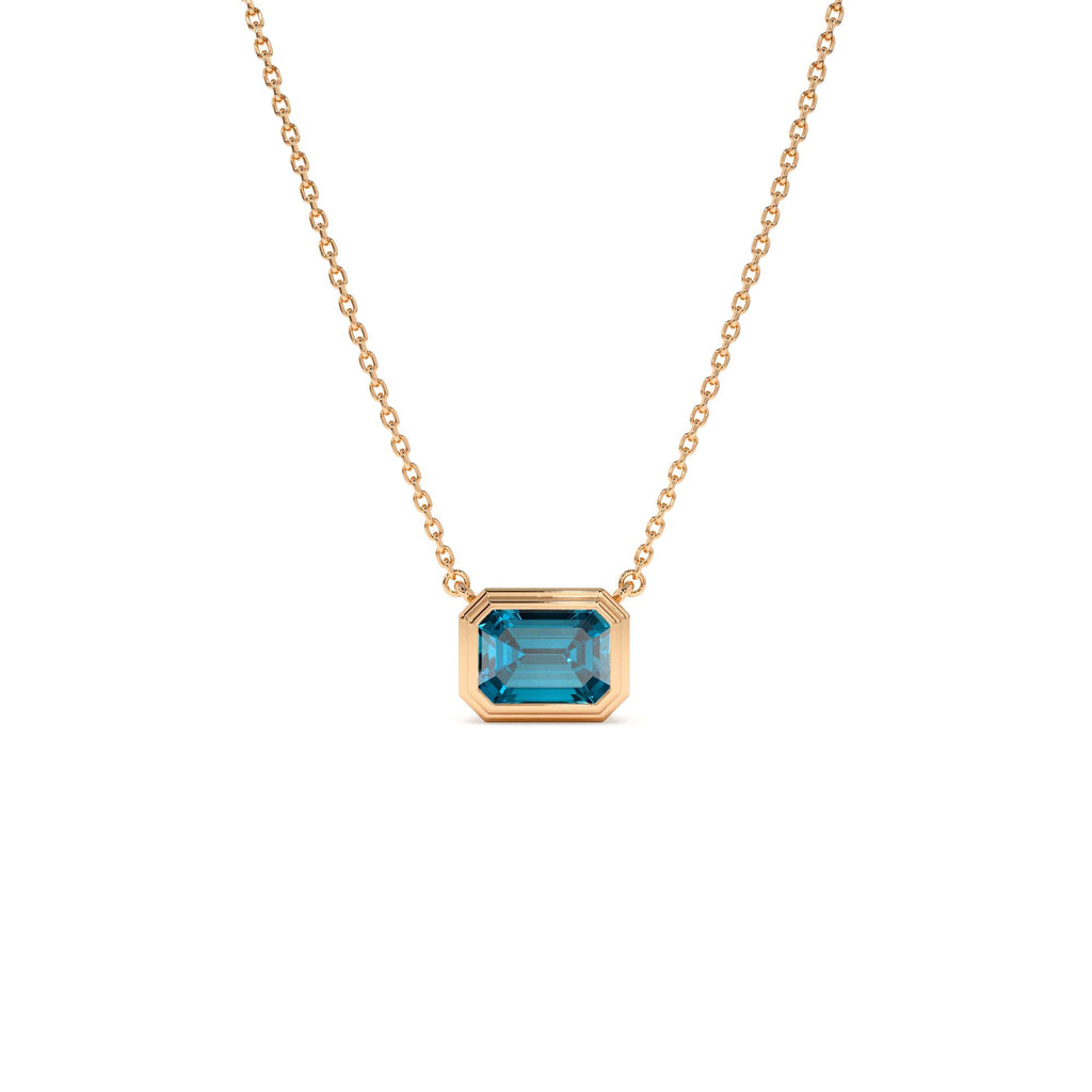 14K Gold 1.25 ctw Emerald Cut Bezel Setting Blue Topaz - view 2
