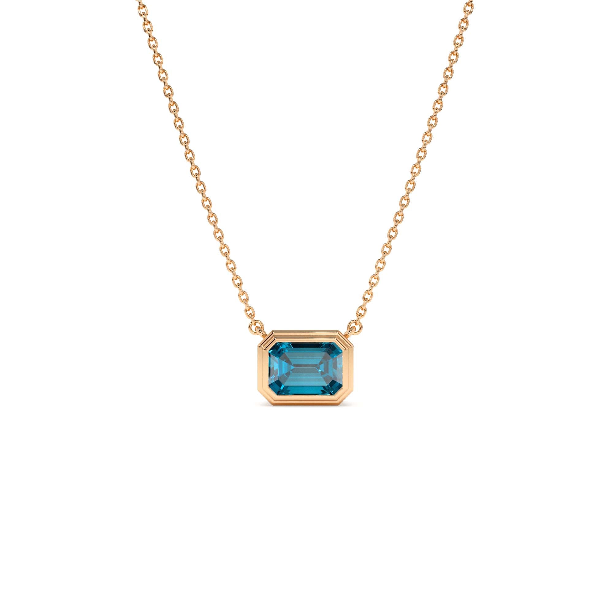 14K Gold 1.25 ctw Emerald Cut Bezel Setting Blue Topaz - view 2