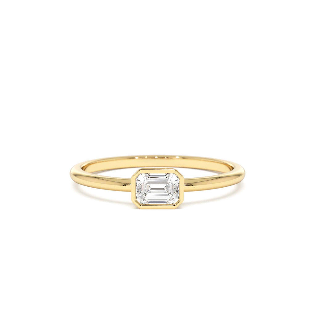 14k Bezel Set Emerald Cut Diamond Solitaire Ring by Orlina Fine