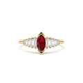 14k Gold Marquise Shape Ruby Ring with Baguette Accents by Orlina Fine