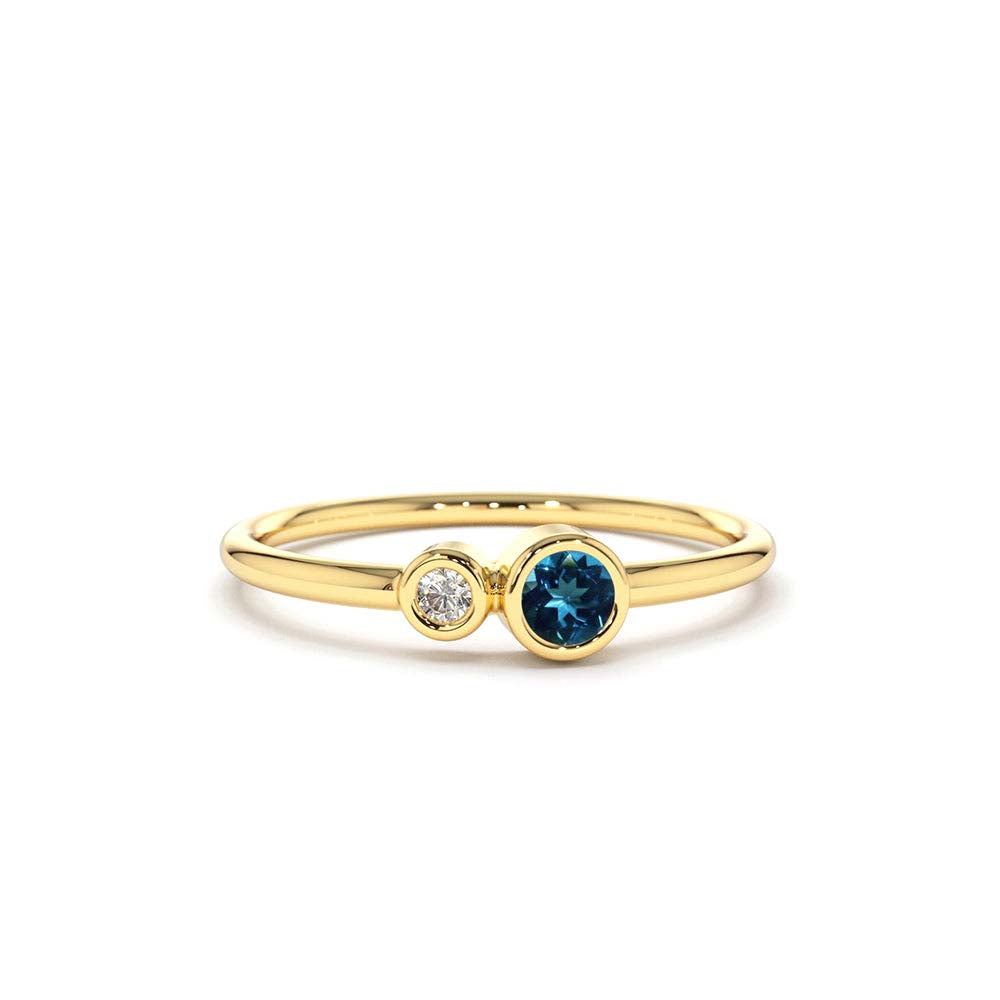 14K Gold Bezel Setting London Blue Topaz and Diamond Ring by Orlina Fine