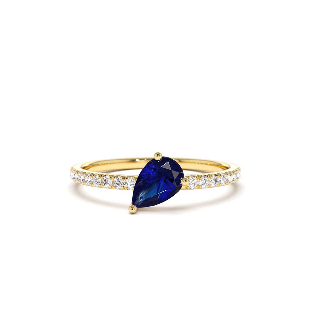 14K Slanted Pear Shape Sapphire Ring with Pave Diamonds by Orlina Fine