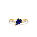 14K Slanted Pear Shape Sapphire Ring with Pave Diamonds by Orlina Fine