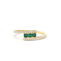 14K Cross Over Diamond Ring with Round Emeralds by Orlina Fine